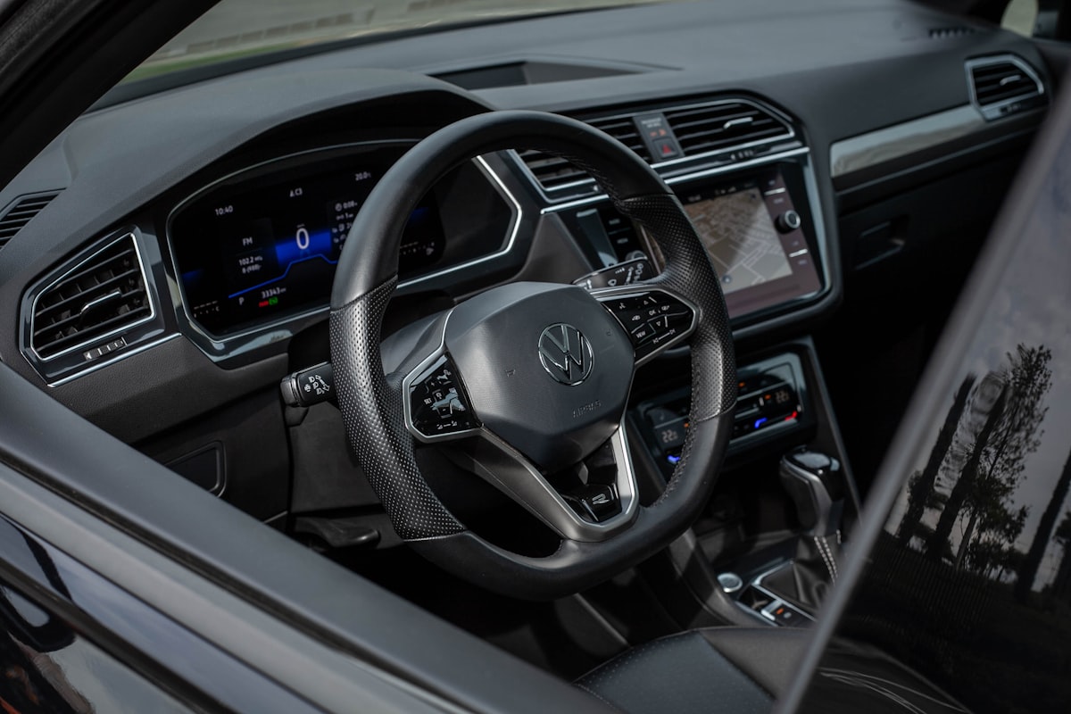 Automotive digital cockpit with infotainment display and instrument cluster