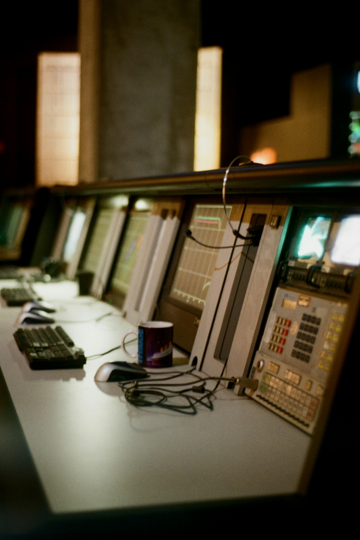 Control room with multiple monitoring stations and displays