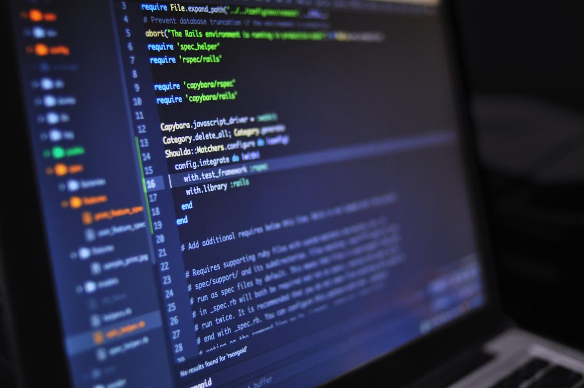 Code on dark screen, software-in-the-loop virtual environment